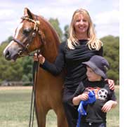Genevieve with handler Anne and Spencer